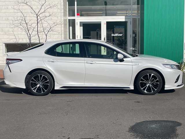 トヨタ カムリ WSレザーパッケージ 青森県 2019(令1)年 4.8万km プラチナホワイトパールマイカ 4WD/寒冷地仕様/純正Tコネクトナビ・フルセグTV/Bluetooth・Miracast/バックカメラ/本革シート/前席パワーシート・シートヒーター/ヘッドアップディスプレイ/セーフティセンス/プリクラッシュセーフティ/レーダークルーズコントロール/レーンディパーチャーアラート/オートマチックハイビーム/ブラインドスポットモニター/インテリジジュントクリアランスソナー/前後ドライブレコーダー/ビルトインETC/パドルシフト/ワイパーデアイサー/LEDヘッドライト/オートライト/LEDフォグランプ/リアフォグランプ/純正18インチアルミ/TRDエアロ