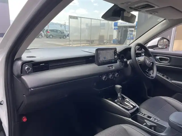 ホンダ ヴェゼル ハイブリッド e:HEV Z 滋賀県 2025(令7)年 0.1千km プラチナホワイトパール 登録済未使用車/純正8インチナビ/（Bluetooth/フルセグ/Apple CarPlay/Android Auto/USB）/純正ビルトインETC2.0/追従クルーズコントロール/バックカメラ/ブラインドスポットモニター/前後コーナーセンサー/運転席/助手席シートヒーター/レーンキープアシスト/オートハイビーム/ダウンヒルアシスト/カーテンエアバッグ/電動リアゲート/ステアリングリモコン/純正18インチアルミホイール/スマートキー/スペアキー