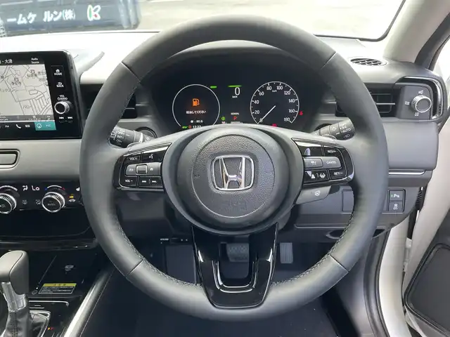 ホンダ ヴェゼル ハイブリッド e:HEV Z 滋賀県 2025(令7)年 0.1千km プラチナホワイトパール 登録済未使用車/純正8インチナビ/（Bluetooth/フルセグ/Apple CarPlay/Android Auto/USB）/純正ビルトインETC2.0/追従クルーズコントロール/バックカメラ/ブラインドスポットモニター/前後コーナーセンサー/運転席/助手席シートヒーター/レーンキープアシスト/オートハイビーム/ダウンヒルアシスト/カーテンエアバッグ/電動リアゲート/ステアリングリモコン/純正18インチアルミホイール/スマートキー/スペアキー