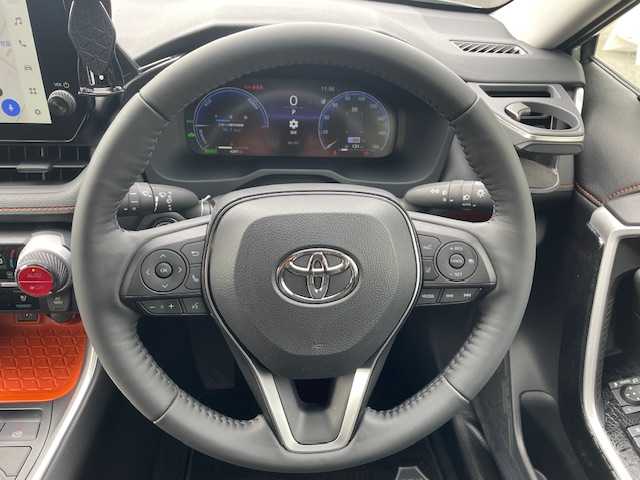 トヨタ ＲＡＶ４ ハイブリッド アドベンチャー 静岡県 2025(令7)年 0.4万km アーバンカーキ ●ワンオーナー/●純正10.5インチナビ/(フルセグ/Bluetooth)/●全方位カメラ/●JAOSフロントプロテクター/●JAOSピラープロテクター/●TRDマフラー/●モデリスタサイドステップ/●プリクラッシュセーフティ/●レーンキープアシスト/●レーダークルーズコントロール/●ブラインドスポットモニター/●前後クリアランスソナー/●電動パーキングブレーキ/●オートブレーキホールド/●電動リアゲート/●LEDヘッドライト/●フォグランプ/●オートライト/●オートマチックハイビーム/●革巻きステアリング/●ステアリングスイッチ/●ステアリングヒーター/●運転席パワーシート(シートメモリー付き)/●前席シートヒーター/●前後ドライブレコーダー/●デジタルインナーミラー/●ETC2.0/●純正フロアマット/●ドアバイザー/●トノカバー/●サンルーフ/●横滑り防止装置/●ISOFIX/●純正19インチアルミホイール/●W＋サイド＋カーテンSRS＋ABS/●保証書/●取扱説明書