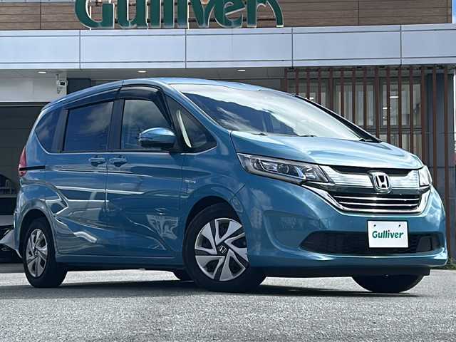 ホンダ フリード ハイブリット G ホンダセンシング 沖縄県 2018(平30)年 5.3万km ブルーホライゾンM 両側パワースライドドア　/純正９インチナビ　/フルセグTV　/バックカメラ　/ビルトインETC　/LEDオートライト　/スマートキー　/パワーステアリング　/パワーウィンドウ　/スペアキー1本