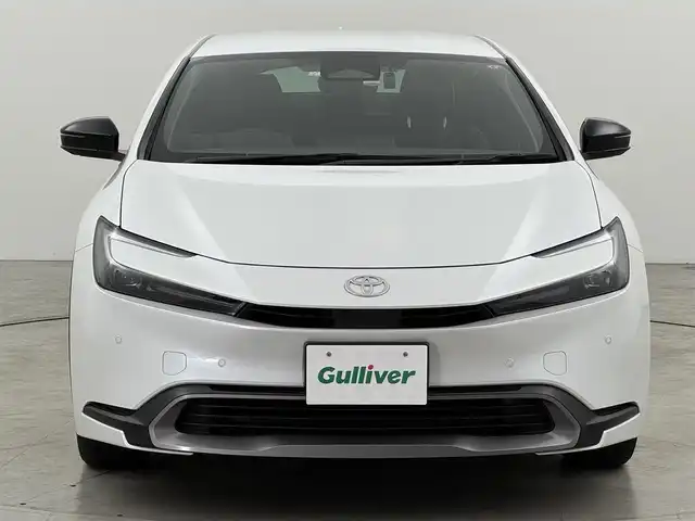 トヨタ プリウス G 福岡県 2023(令5)年 2万km プラチナホワイトパールマイカ 純正ＤＡナビ/フルセグTV　/全方位カメラ　/前方ドラレコ　/レーダー探知機　/ビルトインＥＴＣ２．０　/トヨタセーフティセンス　/レーダークルーズコントロール　/コーナーセンサー　/衝突軽減ブレーキ　/レーンキープ　/アクセル踏み間違い防止　/ブラインドスポットモニター　/寒冷地仕様　/シートヒーター　/純正１９インチＡＷ　/ＬＥＤヘッドライト