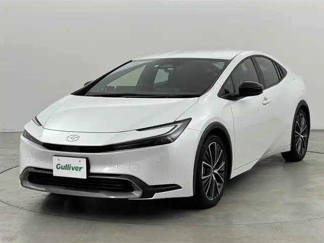 トヨタ プリウス G 福岡県 2023(令5)年 2万km プラチナホワイトパールマイカ 純正ＤＡナビ/フルセグTV　/全方位カメラ　/前方ドラレコ　/レーダー探知機　/ビルトインＥＴＣ２．０　/トヨタセーフティセンス　/レーダークルーズコントロール　/コーナーセンサー　/衝突軽減ブレーキ　/レーンキープ　/アクセル踏み間違い防止　/ブラインドスポットモニター　/寒冷地仕様　/シートヒーター　/純正１９インチＡＷ　/ＬＥＤヘッドライト