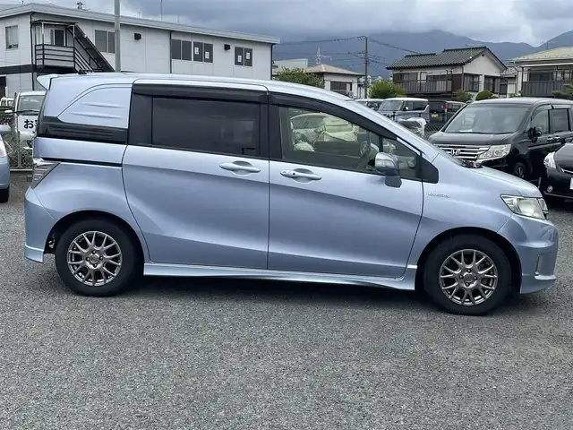 ホンダ フリード スパイク ハイブリット ジャストセレクション 神奈川県 2014(平26)年 10.8万km プレミアムブルーオパールメタリック (株)IDOMが運営する【じしゃロン秦野店】の自社ローン専用車両になります。こちらは現金またはオートローンご利用時の価格です。自社ローンご希望の方は別途その旨お申付け下さい/メモリナビ/バックカメラ/両側パワースライドドア/ETC