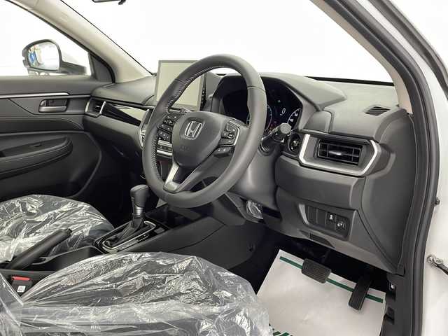 ホンダ ＷＲ－Ｖ Z+ 宮崎県 2024(令6)年 0.1万km未満 プラチナホワイトパール 禁煙車/ホンダセンシング/純正17インチアルミ/純正LEDオートライト/純正LEDフォグ/アダプティブクルーズコントロール/レーンディパーチャーアラート/クリアランスソナー/パドルシフト/ハーフレザーシート/ウインカードアミラー/本革巻ハンドル/オートエアコン/スマートキー/プッシュエンジンスタート/スペアキー/新車時保証書/取扱い説明書