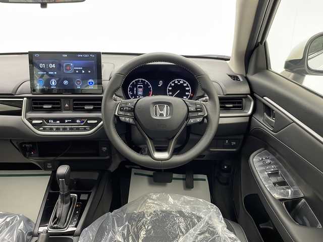 ホンダ ＷＲ－Ｖ Z+ 宮崎県 2024(令6)年 0.1万km未満 プラチナホワイトパール 禁煙車/ホンダセンシング/純正17インチアルミ/純正LEDオートライト/純正LEDフォグ/アダプティブクルーズコントロール/レーンディパーチャーアラート/クリアランスソナー/パドルシフト/ハーフレザーシート/ウインカードアミラー/本革巻ハンドル/オートエアコン/スマートキー/プッシュエンジンスタート/スペアキー/新車時保証書/取扱い説明書