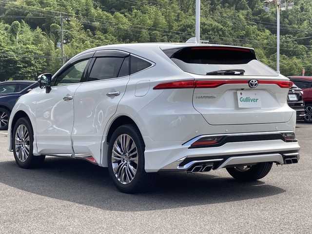 トヨタ ハリアー Z レザーパッケージ 佐賀県 2021(令3)年 3.5万km ホワイトパールクリスタルシャイン モデリスタエアロ/JBLプレミアムサウンド/純正12.3インチナビ/バックカメラ/プリクラッシュセーフティ/レーンディパーチャーアラート/オートハイビーム/アダプティブクルーズコントロール/ブラインドスポットモニター/クリアランスソナー/リアクロストラフィックアラート/ヘッドアップディスプレイ/デジタルインナーミラー（前方録画機能付き）/電動パーキングブレーキ/オートブレーキホールド/レザーシート/メモリ付きパワーシート/シートヒーター/エアシート/ステアリングヒーター/ステアリングスイッチ/レザーステアリング/パワーバックドア/ビルトインETC2.0/プッシュスタート/スマートキー/LEDヘッドライト/フォグライト/純正アルミホイール