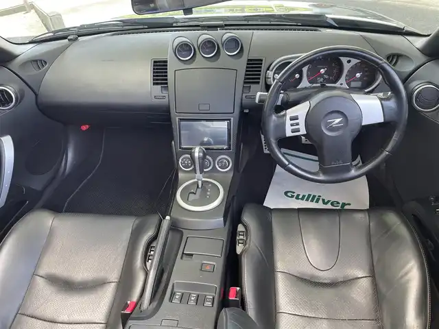 日産 フェアレディ Ｚ ロードスター バージョンT 和歌山県 2004(平16)年 3.3万km スパークリングシルバー 電動オープン　/BOSEサウンドシステム/社外メモリーナビ/iPod/USB/SD/CD/DVD/フルセグTV/内臓メモリ/Bluetooth）/バックカメラ/Ｄ／Ｎ席パワーシート/Ｄ／Ｎ席シートヒーター/スペアキー/黒レザーシート/ＥＴＣ　/純正フロアマット