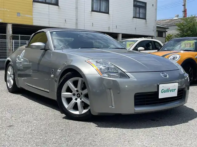 日産 フェアレディ Ｚ ロードスター バージョンT 和歌山県 2004(平16)年 3.3万km スパークリングシルバー 電動オープン　/BOSEサウンドシステム/社外メモリーナビ/iPod/USB/SD/CD/DVD/フルセグTV/内臓メモリ/Bluetooth）/バックカメラ/Ｄ／Ｎ席パワーシート/Ｄ／Ｎ席シートヒーター/スペアキー/黒レザーシート/ＥＴＣ　/純正フロアマット