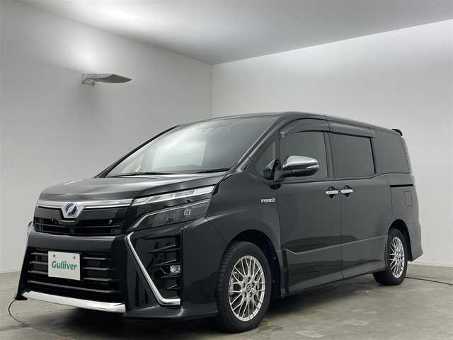 トヨタ ヴォクシー ハイブリッド ZS 煌Ⅱ 岡山県 2020(令2)年 5.3万km ブラック 純正10インチナビ/・バックカメラ/・FM/AM/Bluetooth/フルセグ/CD/DVD/トヨタセーフティーセンス/・プリクラッシュセーフティ/・レーンディパーチャーアラート/・クルーズコントロール/・オートマチックハイビーム/前席シートヒーター/両側パワースライドドア/前方ドライブレコーダー/ビルトインETC/LEDヘッドライト/純正16インチアルミホイール/フロアマット/ドアバイザー