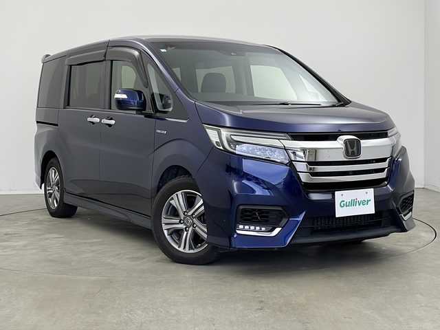 ホンダ ステップワゴン スパーダ ハイブリッド G EX ホンダセンシング 新潟県 2018(平30)年 3.2万km オブシダンブルーパール 純正メモリナビ/（BT/FM/AM/フルセグ/DVD）/全周囲カメラ/ステアリングスイッチ/ハーフレザーシート/シートヒーター/両側パワースライドドア/フリップダウンモニター/純正16インチアルミホイール/純正LEDヘッドライト/電格ミラー/ウィンカーミラー/ドアバイザー/ETC/取扱説明書/整備記録簿