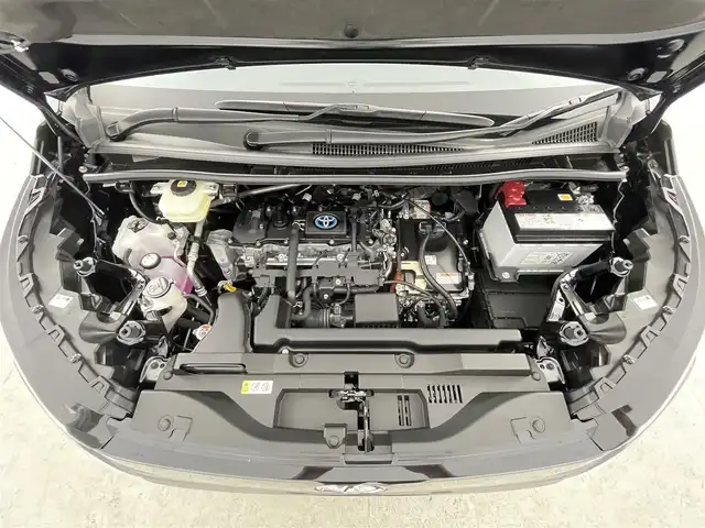トヨタ ヴォクシー ハイブリッド S－Z 千葉県 2025(令7)年 0.2万km アティチュードブラックマイカ 10.5型純正ディスプレイオーディオ/（コネクティットナビ対応）/フルセグTV　Bluetooth　CD　AM/FM/13，2型有機ELフリップダウンモニター/バックカメラ/ビルトインETC2.0/LEDヘッドライト/オートライト/オートハイビーム/シートヒーター/衝突軽減ブレーキ/レーンキープアシスト/コーナーセンサー/パーキングサポートブレーキ/レーダークルーズコントロール/ブラインドスポットモニター/クリアランスソナー/電子パーキング/ブレーキホールド/オートリトラミラー/ステアリングスイッチ/後席USB入力端子/リアサンバイザー/純正アルミホイール/純正フロアマット