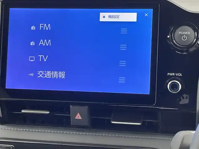 トヨタ ヴォクシー ハイブリッド S－Z 千葉県 2025(令7)年 0.2万km アティチュードブラックマイカ 10.5型純正ディスプレイオーディオ/（コネクティットナビ対応）/フルセグTV　Bluetooth　CD　AM/FM/13，2型有機ELフリップダウンモニター/バックカメラ/ビルトインETC2.0/LEDヘッドライト/オートライト/オートハイビーム/シートヒーター/衝突軽減ブレーキ/レーンキープアシスト/コーナーセンサー/パーキングサポートブレーキ/レーダークルーズコントロール/ブラインドスポットモニター/クリアランスソナー/電子パーキング/ブレーキホールド/オートリトラミラー/ステアリングスイッチ/後席USB入力端子/リアサンバイザー/純正アルミホイール/純正フロアマット