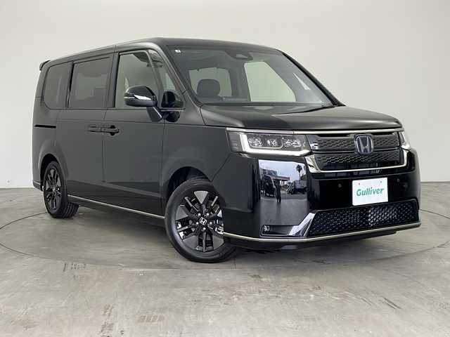 ホンダ ステップワゴン スパーダ eHEV 兵庫県 2025(令7)年 0.1千km クリスタルブラックパール ・登録済未使用車/・11.4インチナビHonda CONNECTナビ /（フルセグ・DVD・CD・BT・SD・HDMI）/・両側パワースライドドア/・パワーバックドア/・ホンダセンシング/・ブラインドスポットモニター/・急アクセル抑制機能/・トラフィックジャムアシスト/・衝突軽減ブレーキ/・先行車発進お知らせ機能/・歩行者事故低減ステアリング/・路外逸脱抑制機能/・標識認識機能/・渋滞追従機能付アダクティブクルーズコントロール/・車線維持支援システム/・誤発進抑制機能/・後方誤発進抑制機能/・後退時出庫サポート/・近距離衝突軽減ブレーキ/・パーキングセンサーシステム/・オートハイビーム/・LEDヘッドライト/・パドルシフト/・純正16インチアルミホイール/・電動パーキングブレーキ/・オートブレーキホールド/・スマートキー/・スペアキー/・プッシュスタート/・ヘッドライトレベライザー/・カーテンエアバック/・W＋サイドエアバック