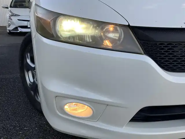 ホンダ ストリーム RSZ 三重県 2006(平18)年 18.6万km プレミアムホワイトパール ♪純正インターナビ/　・DVD再生・CD録音/♪バックカメラ/♪パドルシフト/♪キーレス/♪HIDヘッドライト/♪フォグライト /♪オートライト/♪革巻きステアリング/♪ステアリングスイッチ/♪パドルシフト/♪ETC/♪電動格納ミラー/♪フロアマット/♪スペアタイヤ/♪プライバシーガラス