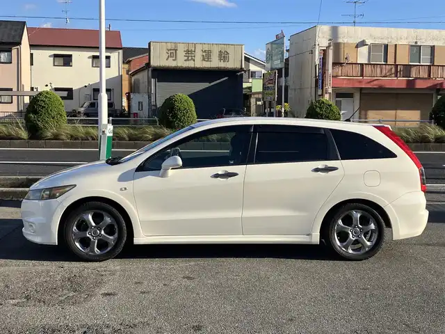 ホンダ ストリーム RSZ 三重県 2006(平18)年 18.6万km プレミアムホワイトパール ♪純正インターナビ/　・DVD再生・CD録音/♪バックカメラ/♪パドルシフト/♪キーレス/♪HIDヘッドライト/♪フォグライト /♪オートライト/♪革巻きステアリング/♪ステアリングスイッチ/♪パドルシフト/♪ETC/♪電動格納ミラー/♪フロアマット/♪スペアタイヤ/♪プライバシーガラス