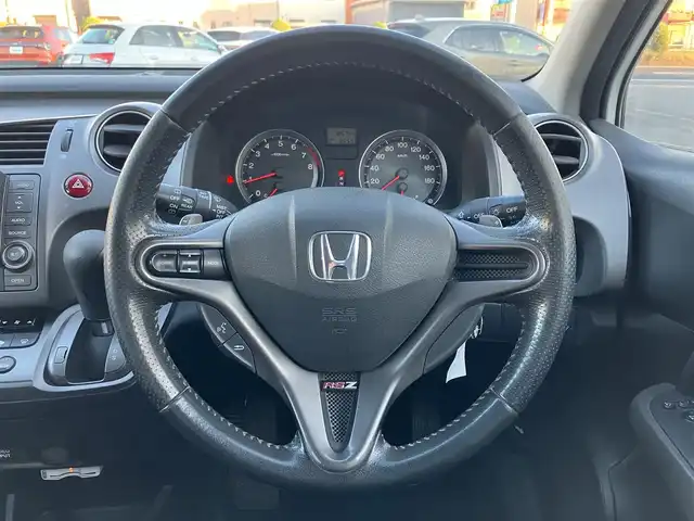 ホンダ ストリーム RSZ 三重県 2006(平18)年 18.6万km プレミアムホワイトパール ♪純正インターナビ/　・DVD再生・CD録音/♪バックカメラ/♪パドルシフト/♪キーレス/♪HIDヘッドライト/♪フォグライト /♪オートライト/♪革巻きステアリング/♪ステアリングスイッチ/♪パドルシフト/♪ETC/♪電動格納ミラー/♪フロアマット/♪スペアタイヤ/♪プライバシーガラス