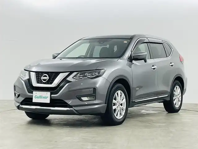 日産 エクストレイル ハイブリッド 20X 福島県 2018(平30)年 6.2万km ダークメタルグレー ブラインドスポットモニター/後退時車両検知/車線逸脱警報装置/エマージェンシーブレーキ/踏み間違い衝突防止アシスト/純正SDナビ/・型番：MM317D-W/・フルセグTV/BT/SD/CD/DVD/AUX/FM/AM/・ETC/・バックカメラ/パワーバックドア/ハーフレザーシート/革張ステアリング/・ステアリングリモコン/ダウンヒルアシストコントロール/ALL MODE 4×4-i切替ダイヤル/プッシュスタート/・スマートキー/・スペアキー1本/電動格納ミラー/・ウィンカーミラー/LEDヘッドライト/・フォグランプ/・オートライト/純正フロアマット/純正17インチAW/純正ドアバイザー