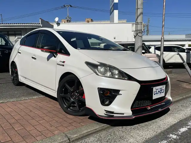 トヨタ プリウス S ツーリングセレ G’s 福岡県 2012(平24)年 11.1万km ホワイトパールクリスタルシャイン (株)IDOMが運営する【じしゃロン八幡西店】の自社ローン対象車両になります。こちらは現金ご利用時の価格です。自社ローンご希望の方は別途その旨お申付け下さい。/社外ディスプレイオーディオ/(Bluetooth/CD/USB/フルセグTV)/トムスフロントスポイラー/トミーカイラリアスポイラー/ローダウン/ロッソモデロマフラー/work18インチアルミホイール/社外デジタルインナーミラー/社外前方ドライブレコーダー/ビルトインＥＴＣ/フォグランプ/オートライト/スペアキー一本/スマートキー