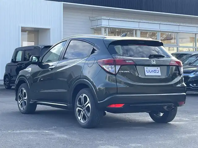 ホンダ ヴェゼル ハイブリッド Z 宮城県 2014(平26)年 12.4万km ミスティックグリーンパール (株)IDOMが運営する【じしゃロン仙台店】の自社ローン専用車両になりますこちらは現金またはオートローンご利用時の価格です。自社ローンご希望の方は別途その旨お申付け下さい/ハーフレザーシート/シートヒーター/メモリナビ/フルセグ/Bluetooth/バックカメラ/ETC/ルーフレール/衝突被害軽減システム/LEDヘッドライト