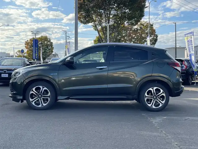 ホンダ ヴェゼル ハイブリッド Z 宮城県 2014(平26)年 12.4万km ミスティックグリーンパール (株)IDOMが運営する【じしゃロン仙台店】の自社ローン専用車両になりますこちらは現金またはオートローンご利用時の価格です。自社ローンご希望の方は別途その旨お申付け下さい/ハーフレザーシート/シートヒーター/メモリナビ/フルセグ/Bluetooth/バックカメラ/ETC/ルーフレール/衝突被害軽減システム/LEDヘッドライト