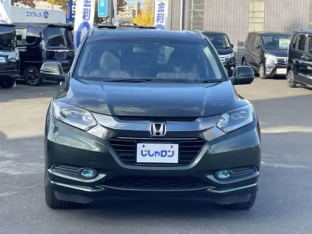 ホンダ ヴェゼル ハイブリッド Z 宮城県 2014(平26)年 12.4万km ミスティックグリーンパール (株)IDOMが運営する【じしゃロン仙台店】の自社ローン専用車両になりますこちらは現金またはオートローンご利用時の価格です。自社ローンご希望の方は別途その旨お申付け下さい/ハーフレザーシート/シートヒーター/メモリナビ/フルセグ/Bluetooth/バックカメラ/ETC/ルーフレール/衝突被害軽減システム/LEDヘッドライト