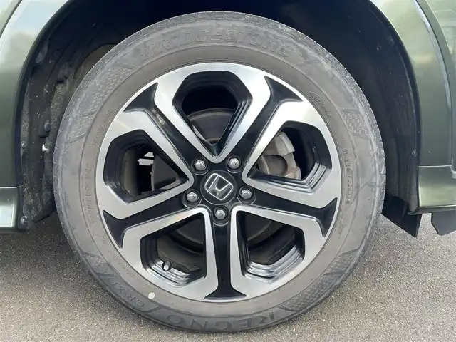 ホンダ ヴェゼル ハイブリッド Z 宮城県 2014(平26)年 12.4万km ミスティックグリーンパール (株)IDOMが運営する【じしゃロン仙台店】の自社ローン専用車両になりますこちらは現金またはオートローンご利用時の価格です。自社ローンご希望の方は別途その旨お申付け下さい/ハーフレザーシート/シートヒーター/メモリナビ/フルセグ/Bluetooth/バックカメラ/ETC/ルーフレール/衝突被害軽減システム/LEDヘッドライト