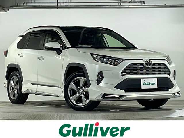 トヨタ ＲＡＶ４ G 広島県 2020(令2)年 7.2万km ホワイトパールクリスタルシャイン ・パノラマムーンルーフ/・モデリスタエアロ/・社外9型ナビ＆TV＆BT＆DVD＆SD/・カロッツェリア後席ヘッドレストモニター/・バックカメラ/・トヨタセーフティセンス/・プリクラッシュセーフティ/・ブラインドスポットモニター/・レーダークルーズコントロール/・レーンディパーチャーアラート/・オートマチックハイビーム/・スマートキー/・プッシュスタート/・合皮シート/・前席シートヒーター/・ステアリングヒーター/・パワーシート/・デジタルインナーミラー/・前後ドライブレコーダー/・フロアマット/・パワーバックドア/・クリアランスソナー/・ビルトインETC/・純正18インチアルミホイール
