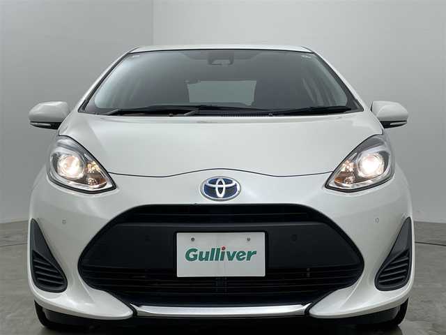 トヨタ アクア S 岡山県 2020(令2)年 6万km ホワイトパールクリスタルシャイン 純正SDナビ/（TV/Bluetooth/CD)/衝突軽減ブレーキシステム/バックカメラ/ビルトインＥＴＣ/ＬＥＤヘッドライト/オートハイビーム/アイドリングストップ/コーナーセンサー（前後）/踏み間違い防止/ISOFIX/ステアリングスイッチ/チルトステアリング/シートリフター/ウインカーミラー/ドアバイザー/プッシュスタート/スマートキー/新車保証書/取扱説明書