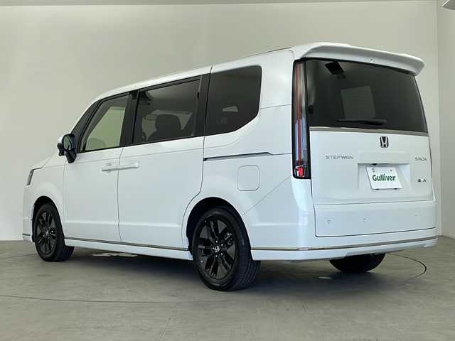 ホンダ ステップワゴン スパーダ eHEV 鹿児島県 2025(令7)年 0.1万km未満 プラチナホワイトパール 登録済未使用車/純正11.4インチナビ/（CD/DVD/BT/フルセグTV）/電動リアゲート/パドルシフト/両側パワースライドドア/ハーフレザーシート/シートヒーター/コーナーセンサ―/レーダークルーズコントロール/オートライト/オートマチックハイビーム/ブラインドスポットモニター