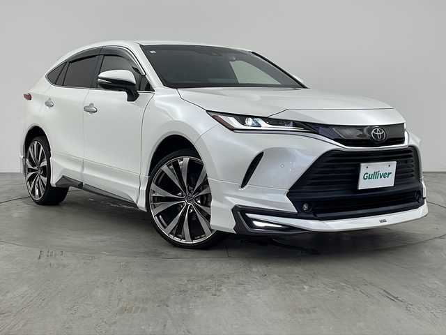 トヨタ ハリアー G 兵庫県 2020(令2)年 4.1万km ホワイトパールクリスタルシャイン ・純正ディスプレイオーディオナビ/・Bluetooth/フルセグテレビ/USB/Miracast/・Toyota Safety Sense/・プリクラッシュセーフティ/・レーントレーシングアシスト /・レーダークルーズコントロール（全車速追従機能付） /・アダプティブハイビームシステム/・ロードサインアシスト/・先行車発進告知機能/・パーキングサポートブレーキ（前後方静止物）/・クリアランスソナー/・デジタルインナーミラー/・ハーフレザーシート/・パワーバックドア/・運転席パワーシート/・モデリスタエアロ/・LEDオートライト/・LEDフロントフォグランプ/・社外22インチアルミホイール/・ビルトインETC2.0/・社外前後ドライブレコーダー/・スマートキー/・取扱説明書/・保証書
