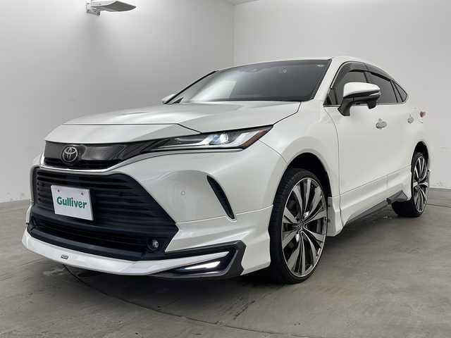 トヨタ ハリアー G 兵庫県 2020(令2)年 4.1万km ホワイトパールクリスタルシャイン ・純正ディスプレイオーディオナビ/・Bluetooth/フルセグテレビ/USB/Miracast/・Toyota Safety Sense/・プリクラッシュセーフティ/・レーントレーシングアシスト /・レーダークルーズコントロール（全車速追従機能付） /・アダプティブハイビームシステム/・ロードサインアシスト/・先行車発進告知機能/・パーキングサポートブレーキ（前後方静止物）/・クリアランスソナー/・デジタルインナーミラー/・ハーフレザーシート/・パワーバックドア/・運転席パワーシート/・モデリスタエアロ/・LEDオートライト/・LEDフロントフォグランプ/・社外22インチアルミホイール/・ビルトインETC2.0/・社外前後ドライブレコーダー/・スマートキー/・取扱説明書/・保証書