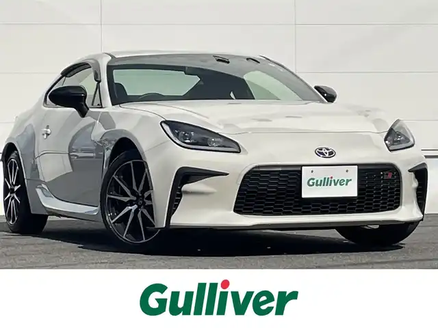 トヨタ ＧＲ８６ SZ 佐賀県 2023(令5)年 2.3万km クリスタルホワイトパール アイサイトコアテクノロジー/・プリクラッシュセーフティ/・全車速追従機能付きクルーズコントロール/・車線逸脱警報/・AT誤発進抑制制御/AT誤後進抑制制御/・後退時ブレーキアシスト/コーナーセンサー/純正9型ナビ/・バックカメラ/・フルセグTV/BT/CD/DVD/純正ドラレコ(DRT-H68A)/純正17インチAW/LEDヘッドライト/ハイビームアシスト/革巻きステアリング/パドルシフト/ETC2.0 /スペアキー×１/取扱説明書/保証書