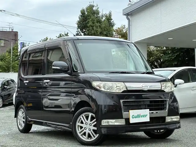 ダイハツ タント カスタム X リミテッド 熊本県 2009(平21)年 12.8万km ブラックマイカ 社外ナビ（CN-E300D）/【ワンセグTV/Bluetooth/CD/AM/FM】/左側パワースライドドア/純正14インチAW/ウィンカーミラー/電格ミラー/スマートキー/純正ドアバイザー/純正フロアマット/革巻きステアリング/ドライブレコーダー/ABS/保証書/取扱説明書