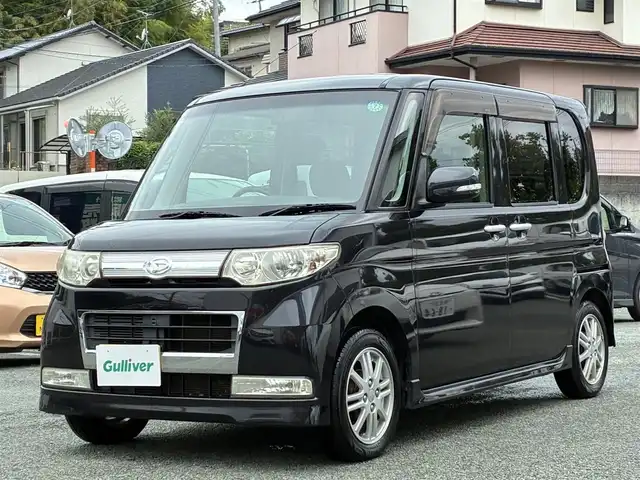 ダイハツ タント カスタム X リミテッド 熊本県 2009(平21)年 12.8万km ブラックマイカ 社外ナビ（CN-E300D）/【ワンセグTV/Bluetooth/CD/AM/FM】/左側パワースライドドア/純正14インチAW/ウィンカーミラー/電格ミラー/スマートキー/純正ドアバイザー/純正フロアマット/革巻きステアリング/ドライブレコーダー/ABS/保証書/取扱説明書