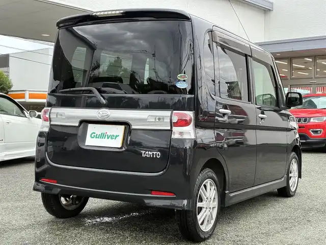 ダイハツ タント カスタム X リミテッド 熊本県 2009(平21)年 12.8万km ブラックマイカ 社外ナビ（CN-E300D）/【ワンセグTV/Bluetooth/CD/AM/FM】/左側パワースライドドア/純正14インチAW/ウィンカーミラー/電格ミラー/スマートキー/純正ドアバイザー/純正フロアマット/革巻きステアリング/ドライブレコーダー/ABS/保証書/取扱説明書