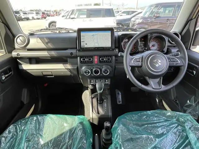 スズキ ジムニー ノマド FC 佐賀県 2025(令7)年 0.1千km ベージュ 登録時走行距離42Km/パートタイム4WD/パイオニア9インチメモリーナビゲーション/・フルセグTV/CD/DVD/SD/Bluetooth/バックカメラ/ミラーヒーター/DN席シートヒーター/ISOFIX対応/革巻きステアリング/ステアリングリモコン/純正15インチアルミホイール/純正LEDヘッドライト/・オートマチックハイビーム/純正フォグランプ/リヤフォグランプ/純正フロアマット/純正ドアバイザ―/色コード「E5J」/アダプティブクルーズコントロール/デュアルカメラブレーキサポート/車線逸脱警報機能/パーキングセンサー