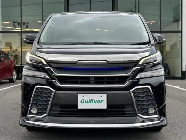 トヨタ ヴェルファイア Z Gエディション 愛媛県 2015(平27)年 8.6万km ブラック 登録時走行距離：85346Km/メーカーOP純正SDメモリーナビ/AM/FM/DVD/フルセグTV/BT/横滑り防止装置/盗難防止装置/純正ビルトインETC/エンジンスタートボタン/クルコン/ＡＢS/LEDヘッドライト/オートライト/両側パワスラ/スマートキー/ハンドルヒーター/純正フロアマット/社外アルミホイール