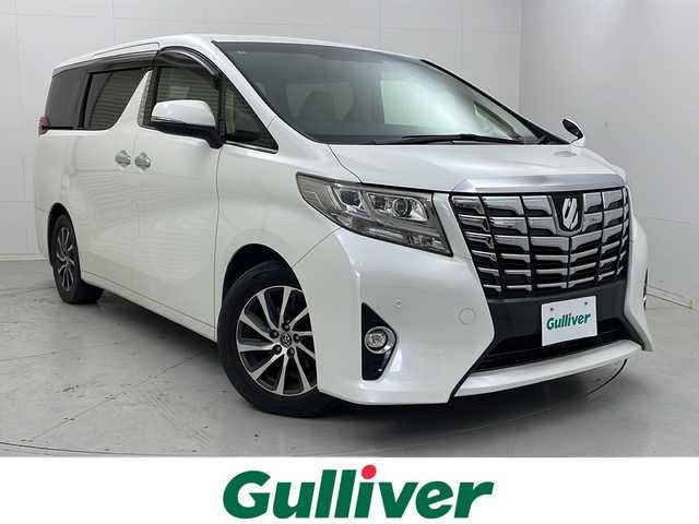 トヨタ アルファード G 茨城県 2015(平27)年 7.1万km ホワイトパールクリスタルシャイン 純正ナビ/フルセグTV/バックカメラ/ETC/クルーズコントロール/オットマン/両側パワースライドドア/パワーシート/純正17インチアルミホイール/コーナーセンサー/横滑り防止装置/衝突軽減ブレーキ/LEDヘッドライト/フロントフォグランプ