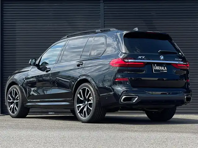 ＢＭＷ Ｘ７ xDrive35d Mスポーツ 山梨県 2019(令1)年 6万km サファイアブラックP スカイラウンジ/ライブコックピット/Mエアロダイナミクスパッケージ/Mスポーツブレーキ/フルセグ/Bluetooth/AppleCarPlay/ワイヤレスチャージ/HUD/harman/kardon/茶革/全席シートH/前席ベンチレーション/ステアリングH/パワーシート/エアサス/アルカンターラルーフ/電動テールゲート/3列シート/BMWレーザー・ライト/ETC/純正22インチAW
