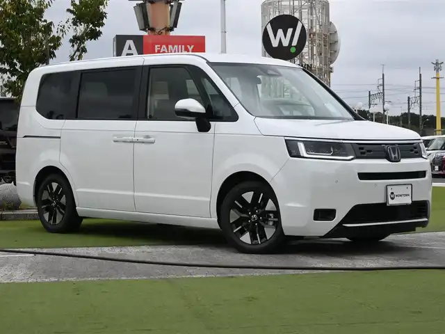 ホンダ ステップワゴン eHEV エアー EX 千葉県 2025(令7)年 0.1千km プラチナホワイトパール e:HEV エアー　EX　4CB4AP3　11.4インチナビHonda CONNECTナビ LXM-247VFLi(317900円)/ホンダセンシング/・衝突軽減ブレーキ（CMBS）/・車線維持支援システム（LKAS）/・アダプティブクルーズコントロール（ACC）/・後方誤発進抑制機能/・誤発進抑制機能/パワーバックドア/両側パワースライドドア/前席シートヒーター/後席オットマン/ホンダコネクトナビ/地デジTV/【DVD/CD再生機能　Bluetooth接続】/バックカメラ/革巻きステアリング/ステアリングスイッチ/パドルシフト/LEDヘッドライト/フォグライト/ウインカーミラー/コーナーセンサー/純正16インチアルミホイル/サイド/カーテンエアバッグ/Honda スマートキー