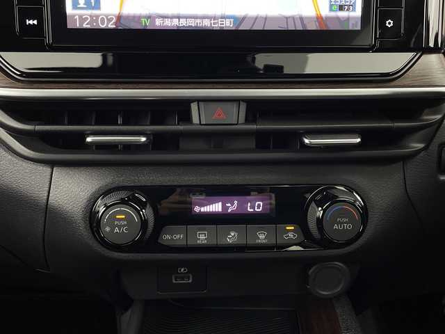 日産 オーラ G レザーエディション 新潟県 2022(令4)年 1.8万km ガーネットレッド/スーパーブラック 2トーン エマージェンシーブレーキ/純正ナビ/　CD/DVD/Bluetooth/フルセグ/アラウンドビューモニター/LEDオートライト/ブラインドスポットモニター/デジタルインナーミラー/クリアランスソナー/電格ミラー/ウィンカーミラー/純正ドラレコ/ステアリングリモコン/スマートキー/ビルトインETC