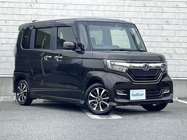 ホンダ Ｎ ＢＯＸ カスタム G L ホンダセンシング 山形県 2018(平30)年 1.8万km プレミアムグラマラスブロンズP 禁煙車/Honda SENSING/・衝突軽減ブレーキ（ＣＭＢＳ）/・路外逸脱抑制機能/・先行車発進お知らせ機能/・アダプティブクルーズコントロール（ＡＣＣ）/・車線維持支援システム（ＬＫＡＳ）/・標識認識機能/・誤発進抑制機能 /片側パワースライドドア/社外ナビ（CD.DVD.BT.SD)/地デジ/バックカメラ/LEDヘッドライト/ドライブレコーダー/ロールアップサンシェード/プッシュスタート/スマートキーｘ２