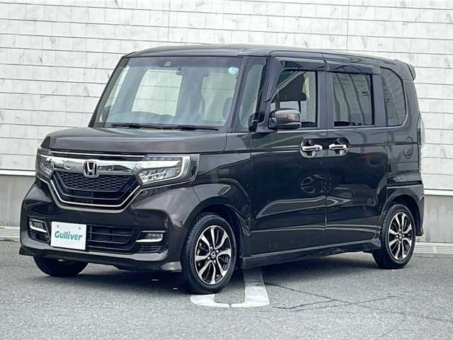 ホンダ Ｎ ＢＯＸ カスタム G L ホンダセンシング 山形県 2018(平30)年 1.8万km プレミアムグラマラスブロンズP 禁煙車/Honda SENSING/・衝突軽減ブレーキ（ＣＭＢＳ）/・路外逸脱抑制機能/・先行車発進お知らせ機能/・アダプティブクルーズコントロール（ＡＣＣ）/・車線維持支援システム（ＬＫＡＳ）/・標識認識機能/・誤発進抑制機能 /片側パワースライドドア/社外ナビ（CD.DVD.BT.SD)/地デジ/バックカメラ/LEDヘッドライト/ドライブレコーダー/ロールアップサンシェード/プッシュスタート/スマートキーｘ２