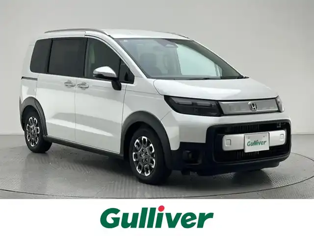 ホンダ フリード ハイブリット e:HEV クロスター 兵庫県 2025(令7)年 0.1千km プラチナホワイトパール 登録済未使用車/純正メモリナビ（BT・USB・フルセグ・appleCarplay・AndroidAuto）/バックカメラ/両側パワースライドドア/純正Aw15インチ/ハーフレザーシート/シートヒーター（D/N席）/プッシュスタート/スマートキー×2/オートライト/LEDヘッドランプ/ＬＥＤフォグランプ/コーナーセンサー前後/ルーフレール/ＡＣＣ/ＬＫＡ/ＰＣＳ/ＢＳＭ
