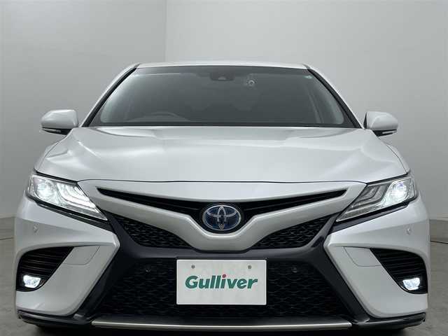 トヨタ カムリ WSレザーパッケージ 岡山県 2020(令2)年 3.1万km プラチナホワイトパールマイカ トヨタセーフティーセンスP/純正９インチディスプレイオーディオ/（フルセグTV、Bluetooth、USB接続、Carplay）/100V電源/ビルトインETC2.0/レーダークルーズコントロール/プリクラッシュセーフティ/ＬＥＤヘッドライト（Auto）/フォグランプ（LED）/オートハイビーム/バックカメラ/パワーシート/シートヒーター/ドライブレコーダー（前）/ブラインドスポットモニター/チルトステアリング/ステアリングスイッチ/ミラーヒーター/ドアバイザー/ISOFIX