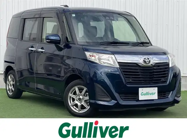 トヨタ ルーミー G 香川県 2019(令1)年 5.1万km レーザーブルークリスタルシャイン 登録時走行距離：50393km/ディーラー純正9型SDナビ/　CD DVD BT　フルセグTV/バックカメラ/両側パワースライドドア/衝突被害軽減装置/クルーズコントロール/オートハイビーム/オートライト/レベライザヘッドライト/アイドリングストップ/横滑り防止装置/ロールサンシェード/ISOFIX/ビルトインETC/前後ドライブレコーダー/プッシュスタート/スマートキー/スペアキー