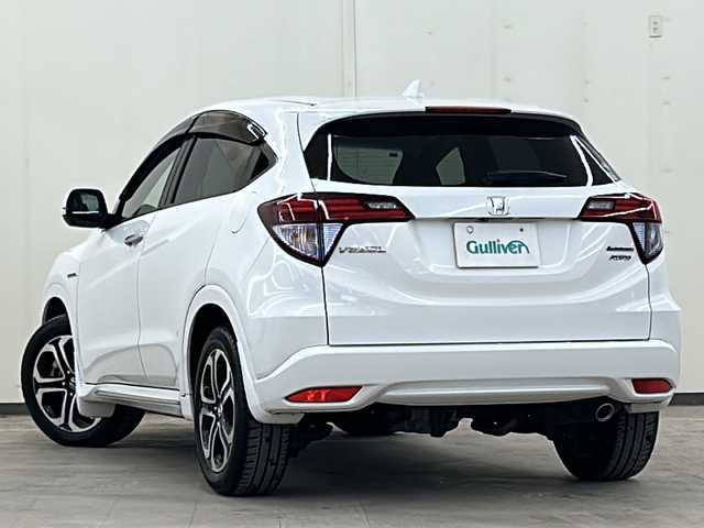 ホンダ ヴェゼル ハイブリッド Z ホンダセンシング 道央・札幌 2016(平28)年 5.4万km ホワイトオーキッドパール 純正メモリナビ・フルセグTV/DVD/CD/USB/SD/Bluetooth/バックカメラ/純正17インチアルミホイール/HONDA SENSING/・アダプティブクルーズコントロール（ACC）/・衝突軽減ブレーキ（CMBS）/・車線維持支援システム（LKAS）/・誤発進抑制機能/・先行車発進お知らせ機能/・オートハイビーム/4WD/ハーフレザーシート/シートヒーター/LEDライト/ビルトインETC/スマートキー/プッシュスタート/新車時保証書/取扱説明書
