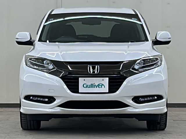 ホンダ ヴェゼル ハイブリッド Z ホンダセンシング 道央・札幌 2016(平28)年 5.4万km ホワイトオーキッドパール 純正メモリナビ・フルセグTV/DVD/CD/USB/SD/Bluetooth/バックカメラ/純正17インチアルミホイール/HONDA SENSING/・アダプティブクルーズコントロール（ACC）/・衝突軽減ブレーキ（CMBS）/・車線維持支援システム（LKAS）/・誤発進抑制機能/・先行車発進お知らせ機能/・オートハイビーム/4WD/ハーフレザーシート/シートヒーター/LEDライト/ビルトインETC/スマートキー/プッシュスタート/新車時保証書/取扱説明書