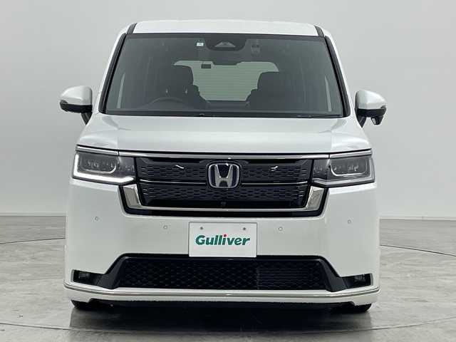 ホンダ ステップワゴン スパーダ eHEV 群馬県 2024(令6)年 0.5万km プラチナホワイトパール 純正１１．４型ナビ　純正１５．６型後席モニター　全周囲カメラ　ダウンサス　ハーフレザーシート　シートヒーター　前後ドラレコ　ＥＴＣ　アダプティブクルーズコントロール　両側電動スライドドア　禁煙車